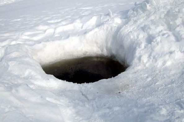 Create meme: the hole , hole in the ice, tunnel in a snowdrift