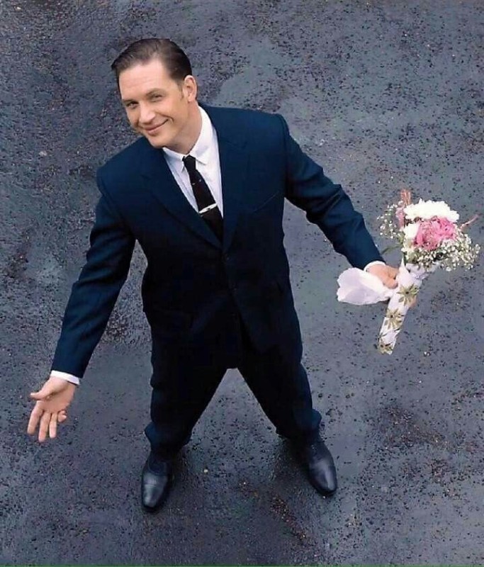 Create meme: Tom hardy is a legend, the legend movie with tom hardy flowers, tom hardy with a bouquet