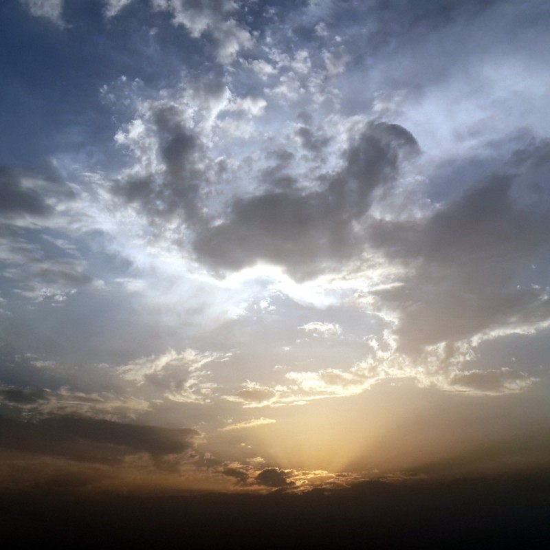 Create meme: cloudy sky with the sun, sun clouds , sky dawn