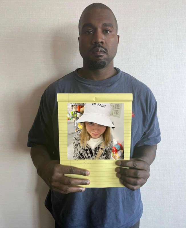 Create meme: kanye west with a leaflet, Kanye West , Kanye West with a piece of paper