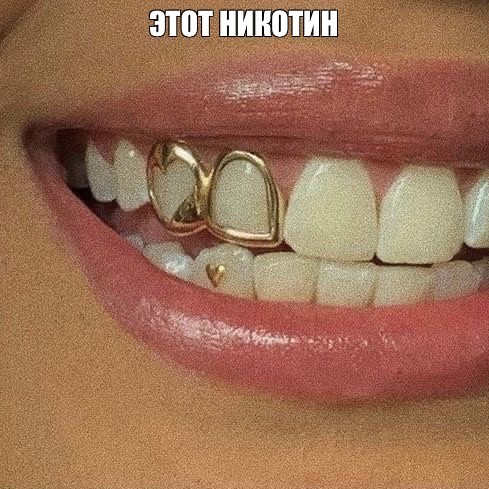 Create meme: grillz the fangs, gold grills for teeth, grillz on the teeth