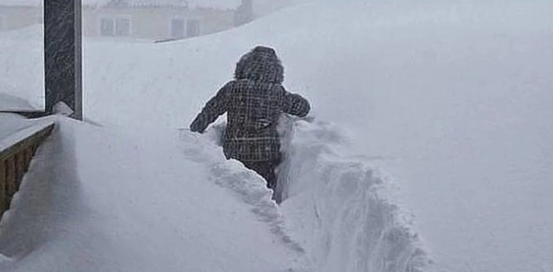 Create meme: Through the snowdrifts, A man walks through snowdrifts, a lot of snow