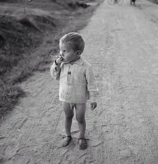 Create meme: kid with a cigarette, boy , the boy with the cigarette