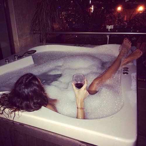 Create meme: jacuzzi with girls and champagne, girl in the bathroom from the back, The girl in the bathtub