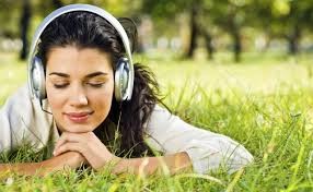Create meme: listen to the music, girl , a woman with headphones