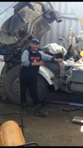 Create meme: repair, car service Tula, engine man at a Chinese dump truck