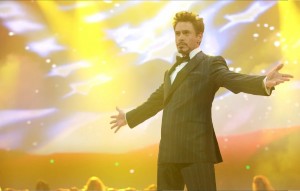 Create meme: Robert Downey, Tony stark throws his hands, people