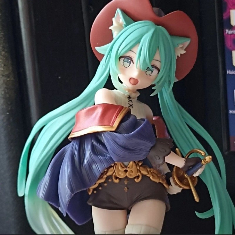 Create meme: hatsune miku figurine, miku figurine, hatsune miku figurine