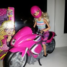 Create meme: Barbie's motorcycle is a secret agent, Barbie on a motorcycle, barbie doll on a motorcycle