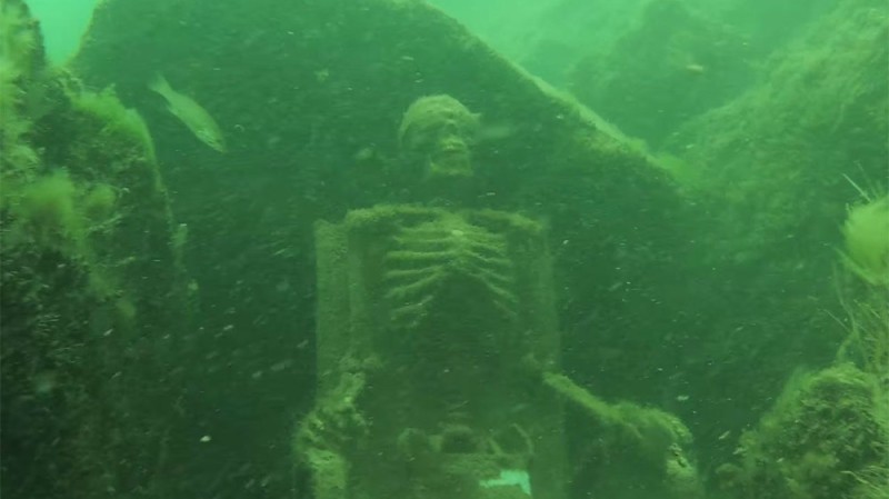 Create meme: the bottom of the lake, a skeleton in the water, the skeleton under water