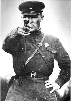 Create meme: NKVD officer with a revolver, NKVD officer, People 's Commissariat of Internal Affairs of the USSR