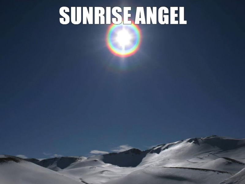 Create meme: mountain snow, rainbow sun, snow ski