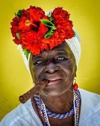 Create meme: Cuban with cigar, Cuban woman with a cigar, Cuban woman