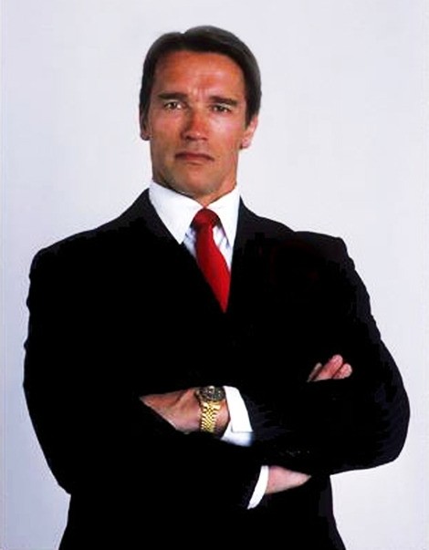 Create meme: Arnold Schwarzenegger in a suit 1986, terminator Schwarzenegger, arnold schwarzenegger rolex