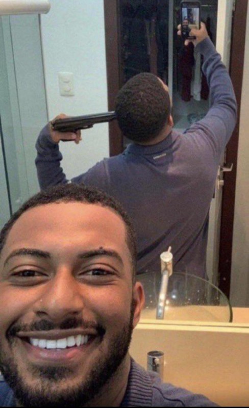 Create meme: Andre Harris, An African-American man with a gun, ebony selfie