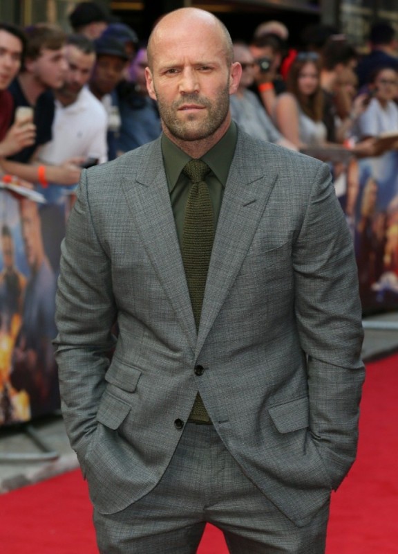 Create meme: Jason Statham , Jason Statham in suit, statham in a coat