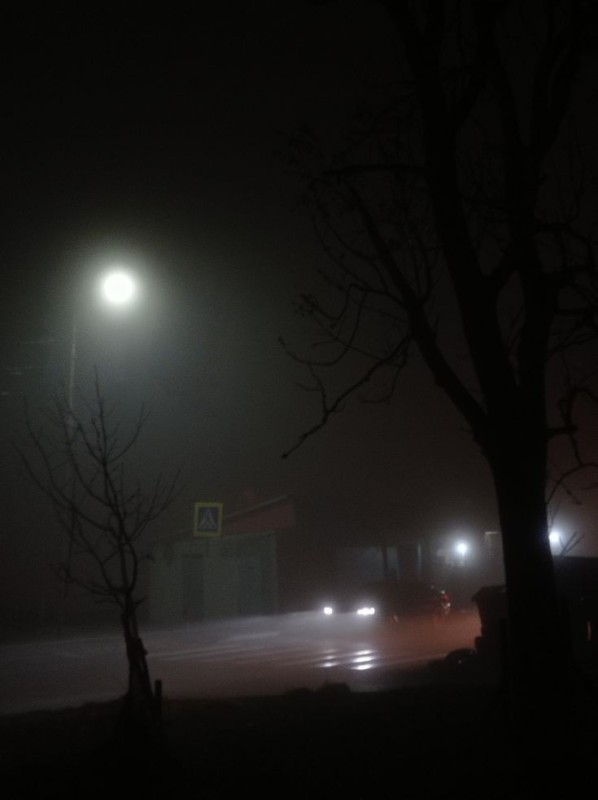 Create meme: fog, street lamp in the fog, evening 