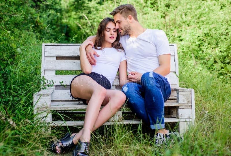 Create meme: A couple is sitting on a bench, a pair of young, a man with girls