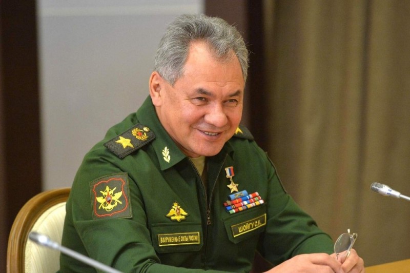 Create meme: Defense Minister before shoigu, shoigu on the tank, shoigu S. K. "about yesterday"