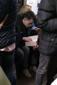 Create meme: girl reading in the subway, to eat in the subway, the attack in St. Petersburg metro