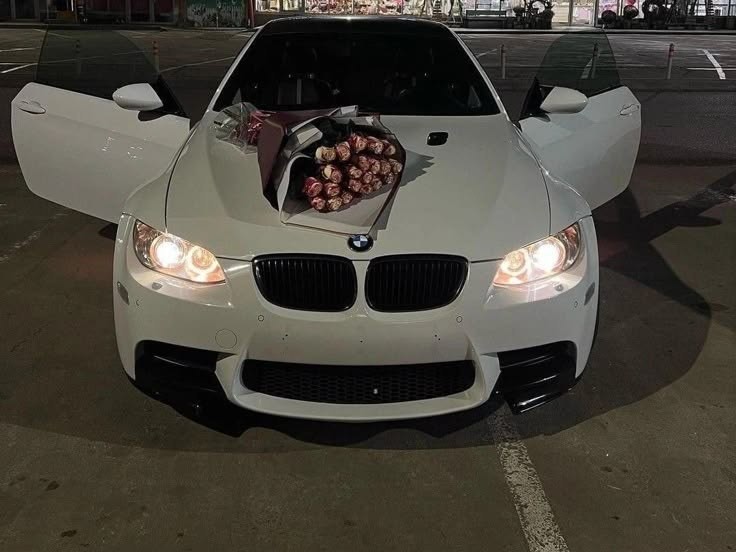 Create meme: a car with flowers, BMW car, BMW with flowers