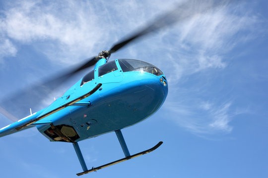 Create meme: The wizard in the blue helicopter, robinson helicopter, blue helicopter