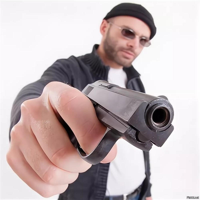 Create meme: A man points a gun at the camera, gun , A gun in the face