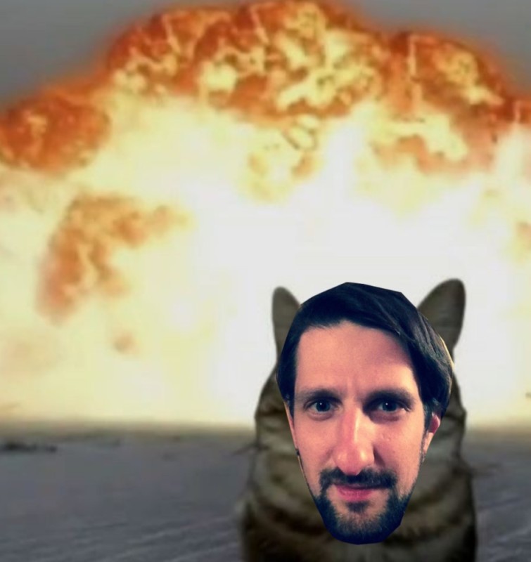 Create meme: cat , cat explosion, against the background of the explosion