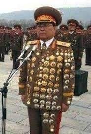 Создать мем: генералы кндр, северокорейский генерал в наградах, корейские генералы в медалях