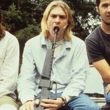 Create meme: Kurt Cobain with a gun, civil defense , Kurt Cobain Nirvana