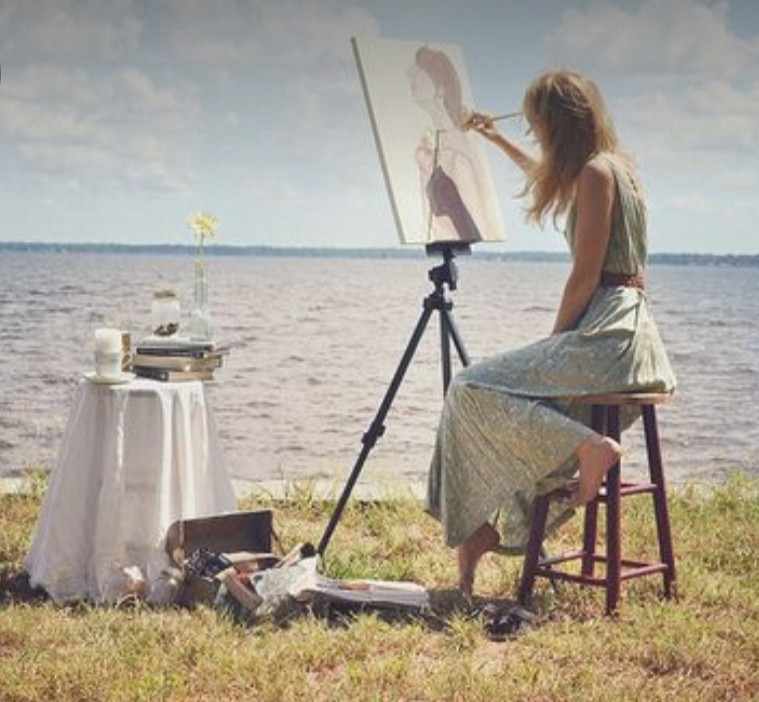 Create meme: easel, photo shoot with an easel, a girl draws on an easel