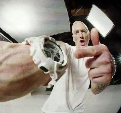 Create meme: Eminem points at his watch, eminem with a watch, eminem with a watch meme