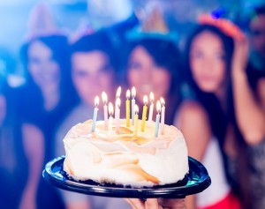 Create meme: a festive cake with candles in the restaurant, cake with candles, celebrate birthday