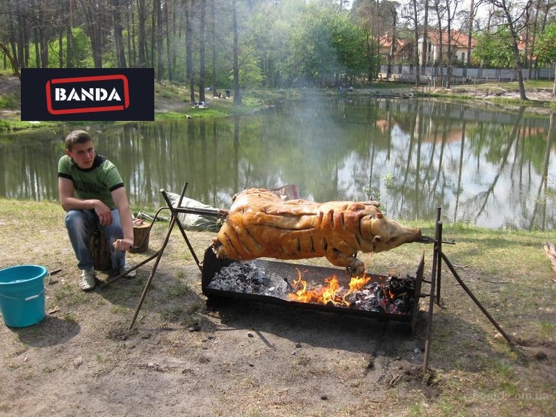 Create meme: outdoors barbecue, a lamb on a spit, pig on a spit