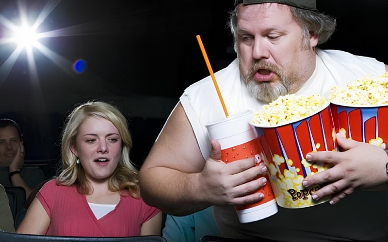 Create meme: the guy with the popcorn, a man with popcorn in the cinema, popcorn at the cinema