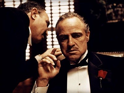 Create meme: don Corleone , Vito Corleone, don Corleone Smoking a cigar