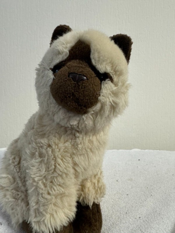 Create meme: A soft toy pug, plush dog toy, Pug is a soft toy