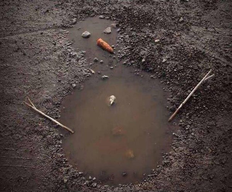 Create meme: snowman made of mud, puddle , a hole in the ground