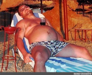 Create meme: Russian on vacation , drunk on vacation, pot-bellied man at sea