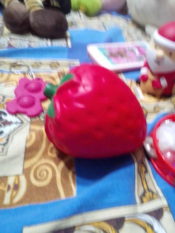 Create meme: strawberry antistress toy, strawberry , toy 