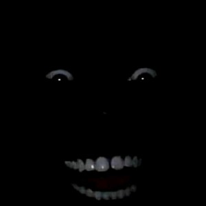 Create meme: Negro in the dark with white teeth, black in the dark, Negro laughing in the dark