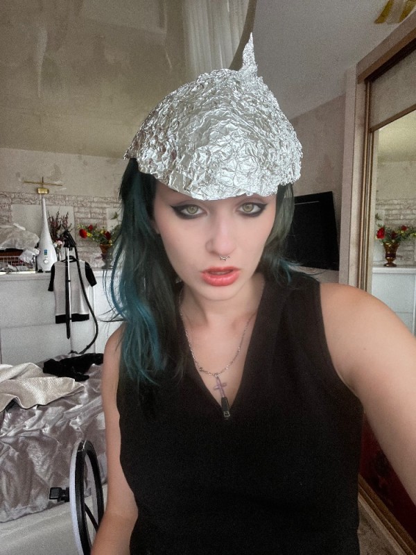 Create meme: foil hat for protection from aliens, girl , foil cap