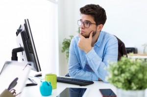 Create meme: laptop, young man, modern office