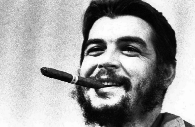 Create meme: che Guevara with a cigar, che guevara biography, che guevara as a young man