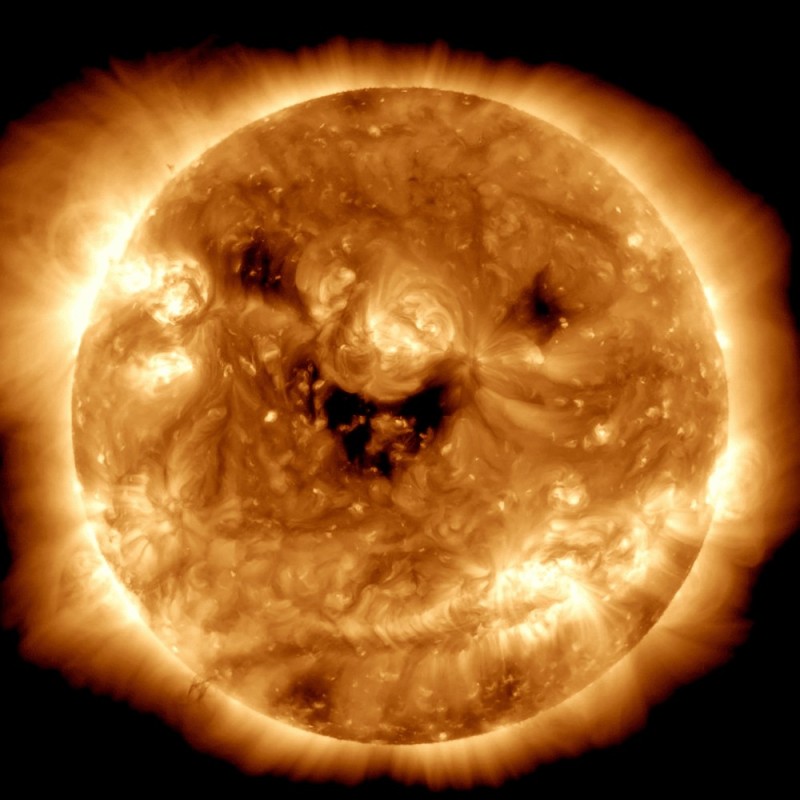 Create meme: coronal holes, pictures of the sun, smiling sun
