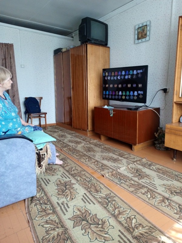 Create meme: furniture , apartment , TV old woman