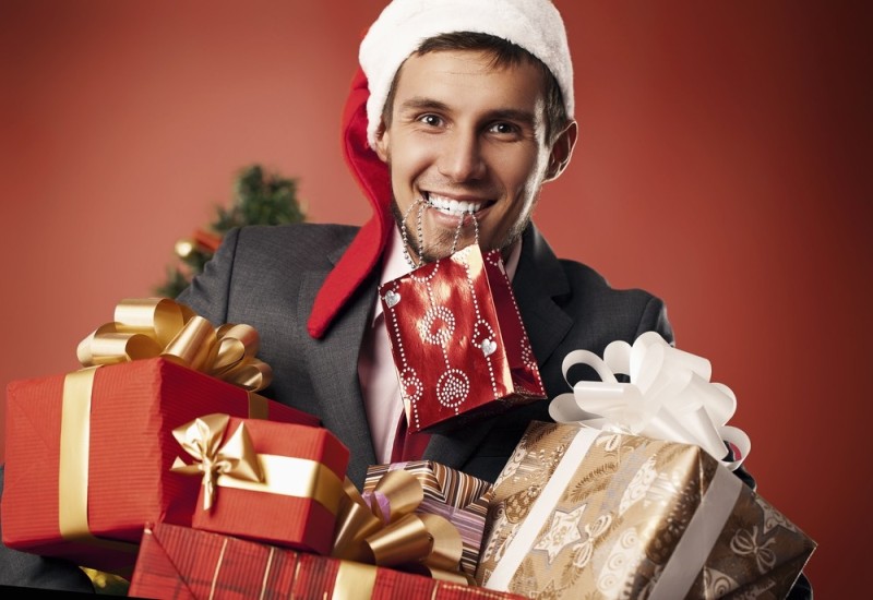 Create meme: New Year's men's, the man with the gift, new year gifts 