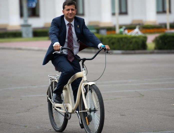 Create meme: on the bike , Zelensky on the bike, the servant of the people, Zelensky on a bicycle