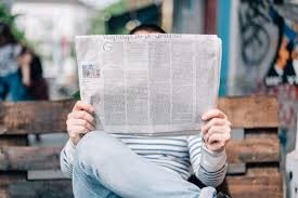 Create meme: The man with the newspaper, photo shoot with a newspaper, street newspaper