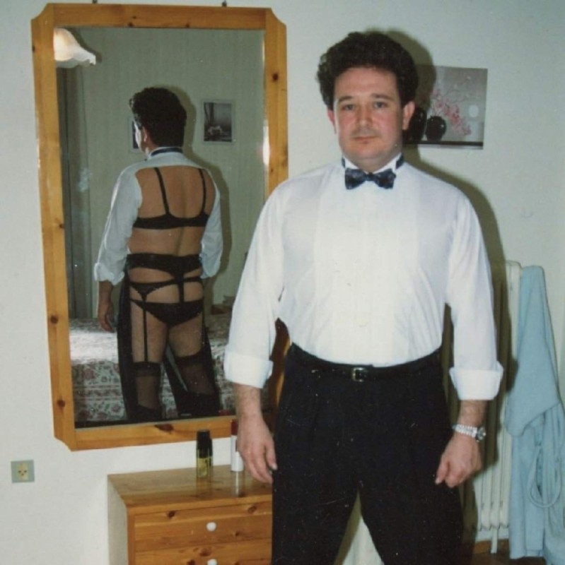 Create meme: a man in a suit with a mirror, meme man in suit in the mirror, a man in a suit at the mirror mep